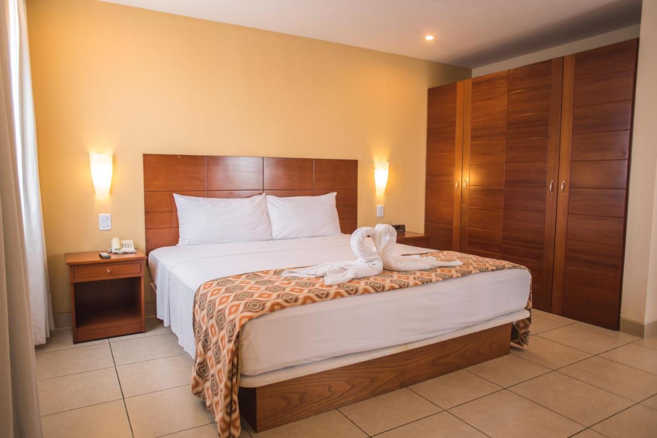 Wyndham Costa Del Sol Pucallpa Bagian luar foto A bedroom at the hotel